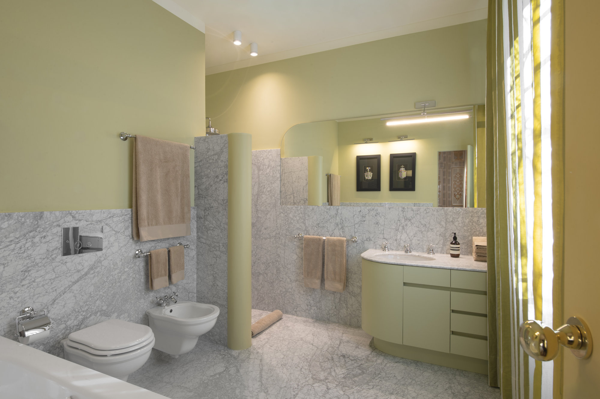 Sage-green bathroom with marble