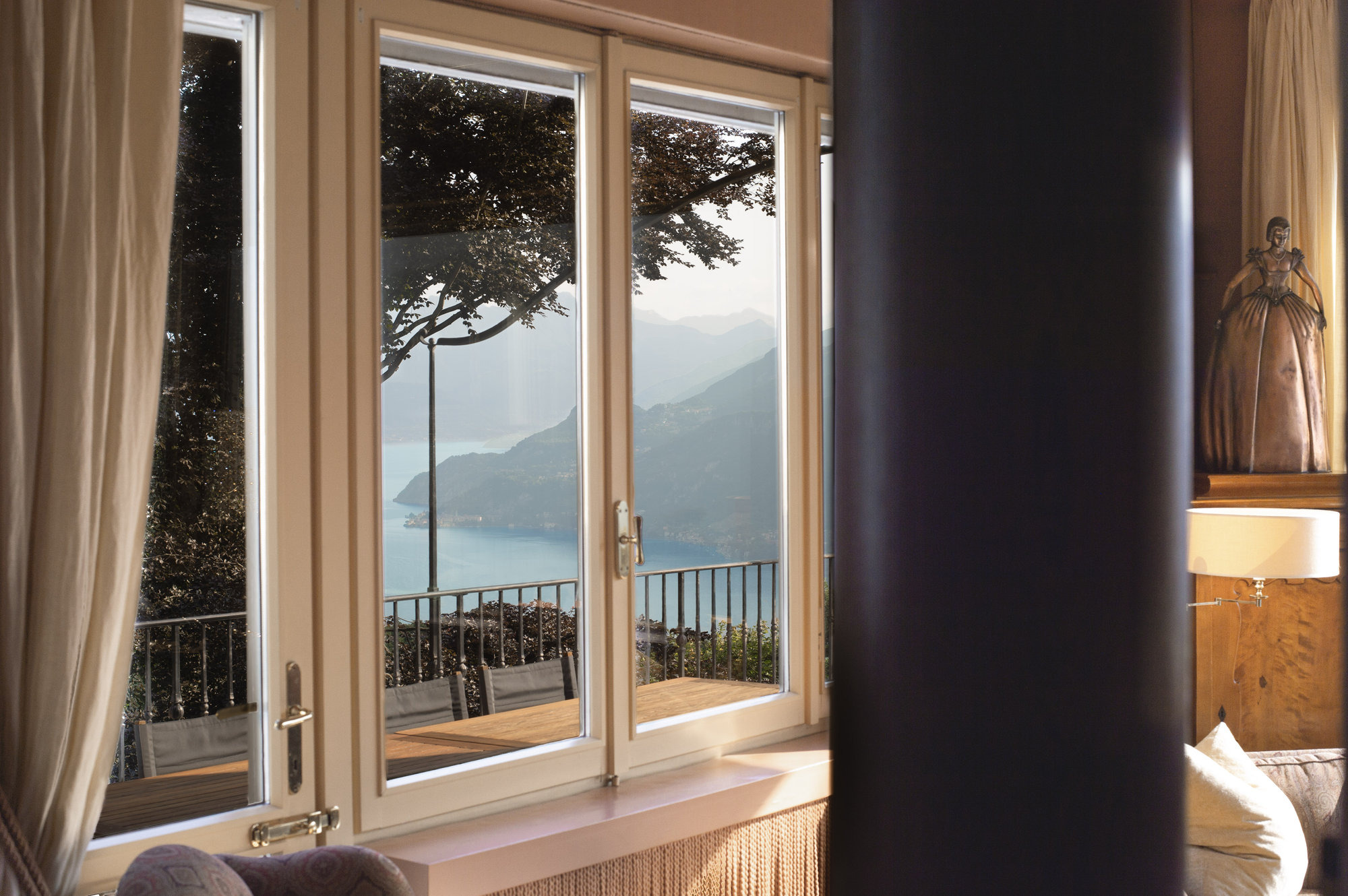 Lake view framed by a window